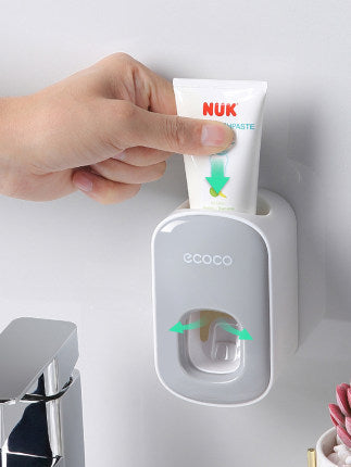 BrushMate™ – Wall-Mounted Toothpaste Dispenser & Organizer for a Clutter-Free Sink
